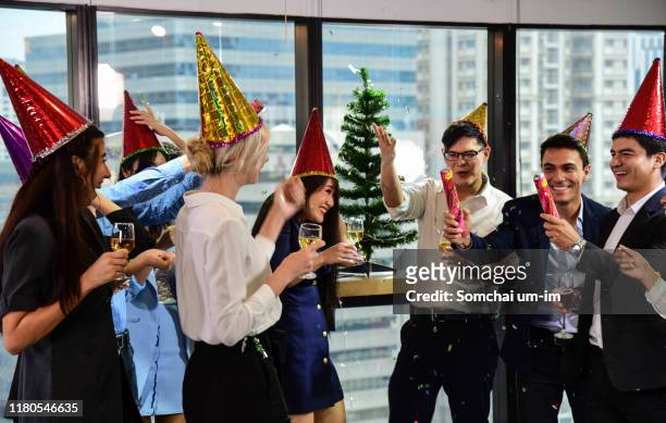 business men and women with glasses of champagne celebrating christmas and new year - work party - fotografias e filmes do acervo