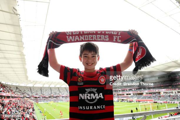 Wanderers fan shows his colours during the round one A-League match between the Western Sydney Wanderers and the Central Coast Mariners at Bankwest...