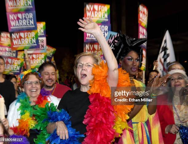 Democratic presidential candidate and U.S. Sen. Elizabeth Warren and drag queen Shea Coulee march in the Southern Nevada Association of Pride Inc....