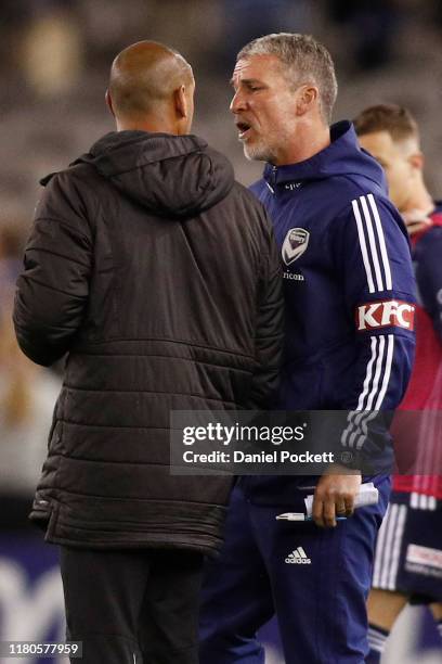 Coach Marco Kurz of the Victory argues with City assistant coach Patrick Kisnorbo after the round one A-League match between the Melbourne Victory...