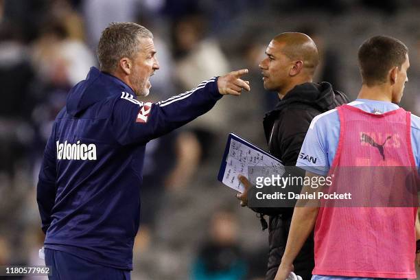 Coach Marco Kurz of the Victory argues with City assistant coach Patrick Kisnorbo after the round one A-League match between the Melbourne Victory...