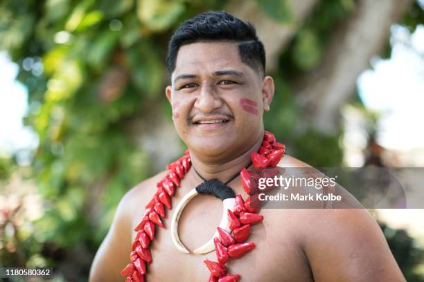Junior Formai poses after performing at the Sheraton Samoa Beach Resort before departing on a Royal Australian Air Force flight to Sydney from...