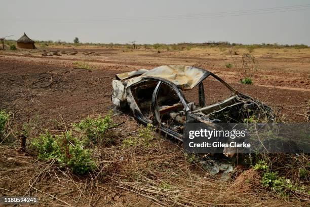 Cars damaged by conflict in northern Burkina Faso