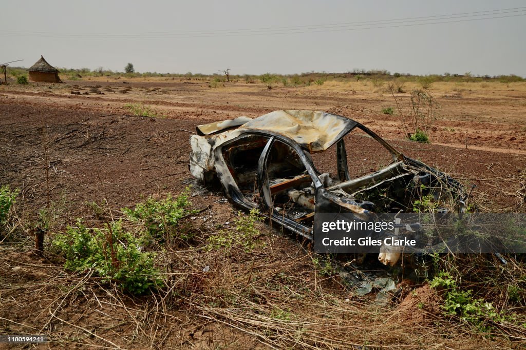 Cars damaged by conflict in northern Burkina Faso