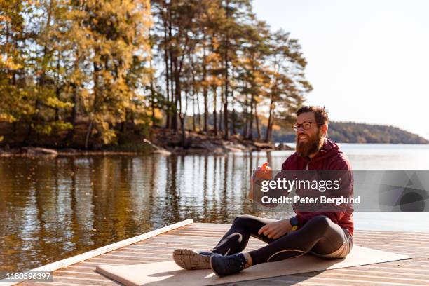 man drinking protein shake - lake auburn stock pictures, royalty-free photos & images