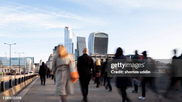 london city workers during rush hour - rush hour london stock pictures, royalty-free photos & images