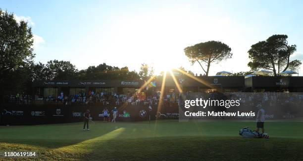 Matthew Fitzpatrick of England makes a putt on the 18th green during Day Three of the Italian Open at Olgiata Golf Club on October 12, 2019 in Rome,...