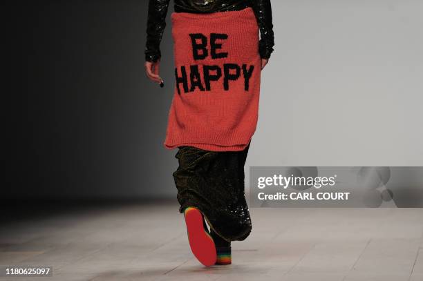 Model presents a creation during the Ashish London 2012 Autumn/Winter collection show at London Fashion Week in London on February 21, 2012. AFP...