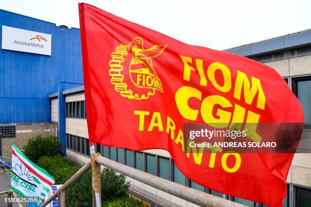 Flag of the FIOM CGIL Italian Federation of Metalworkers is pictured during a strike at the ArcelorMittal Italia steel plant on November 7, 2019 in...