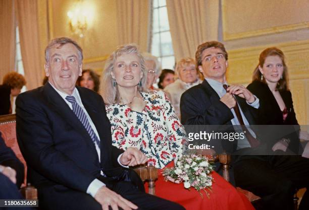 French film director Roger Vadim and French actress Marie-Christine Barrault listen to the speech of the mayor who united them, next to Barrault's...