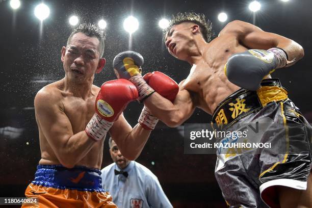 Naoya Inoue of Japan and Nonito Donaire of Philippines fight in their World Boxing Super Series bantamweight final at Saitama Super Arena in Saitama...