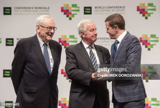 Richard Pound, former president of the World Anti-Doping Agency , outgoing WADA president Sir Craig Reedie and incoming WADA president Witold Banka...