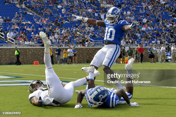 Marquis Waters reacts as teammate Josh Blackwell of the Duke Blue Devils breaks up a pass intended for Tobias Oliver of the Georgia Tech Yellow...