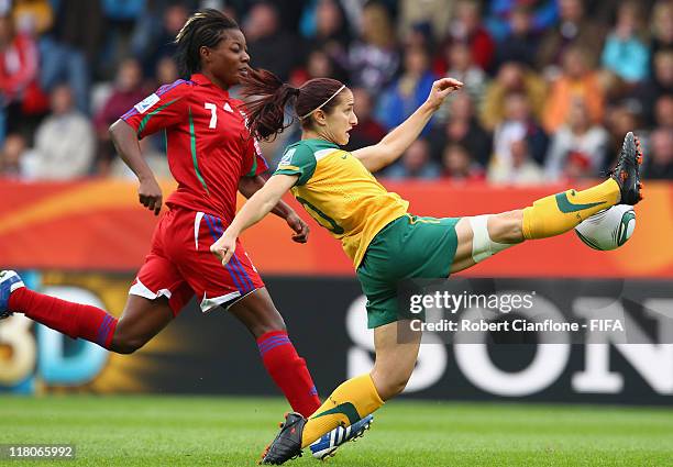 Servet Uzunlar of Australia gets to the ball ahead of Diala of Equatorial Guinea during the FIFA Women's World Cup 2011 Group D match between...