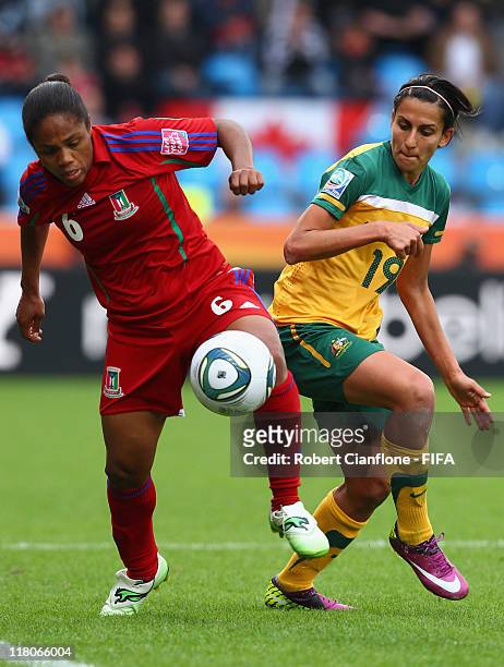Vania of Equatorial Guinea is challenged by Leena Khamis of Australia during the FIFA Women's World Cup 2011 Group D match between Australia and...