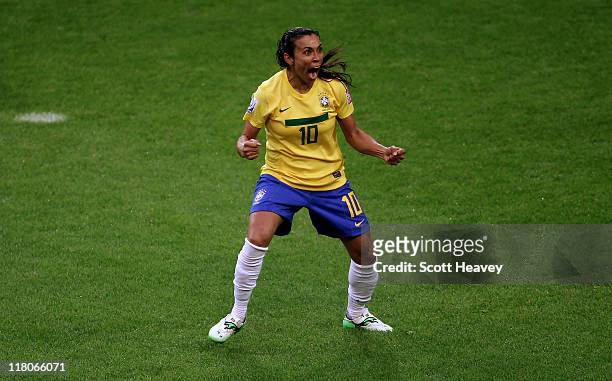 Marta of Brazil celebrates after scoring their first goal during the FIFA Women's World Cup 2011 Group D match between Brazil and Norway at the Arena...