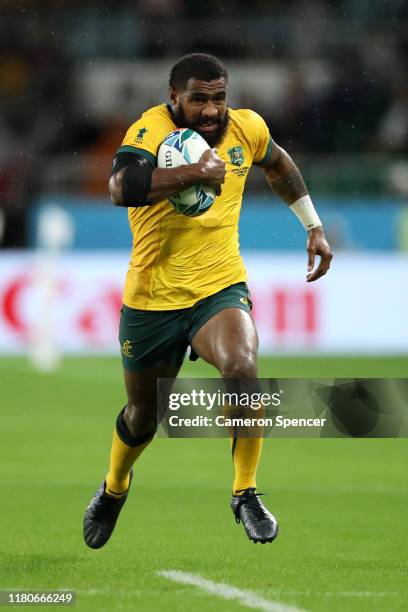 Marika Koroibete of the Wallabies runs the ball during the Rugby World Cup 2019 Group D game between Australia and Georgia at Shizuoka Stadium Ecopa...