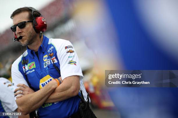 Crew chief Alan Gustafson for Chase Elliott, driver of the NAPA Night Vision Chevrolet, stands on the grid during qualifying for the Monster Energy...