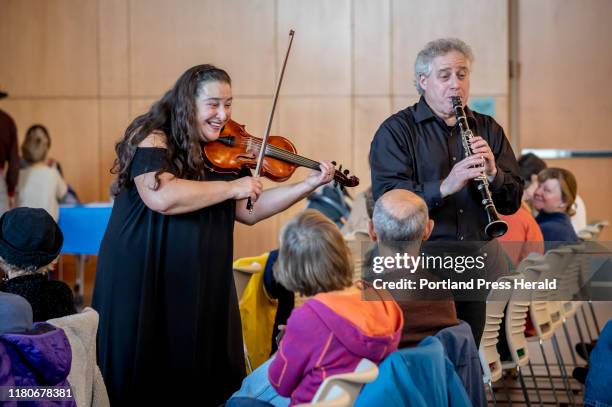 Lisa Mayer, left, and Rabbi Sruli Dresdner, of Auburn, perform klezmer music at the Yiddish Culture Festival Sunday, Nov. 3, 2019 at the Jewish...