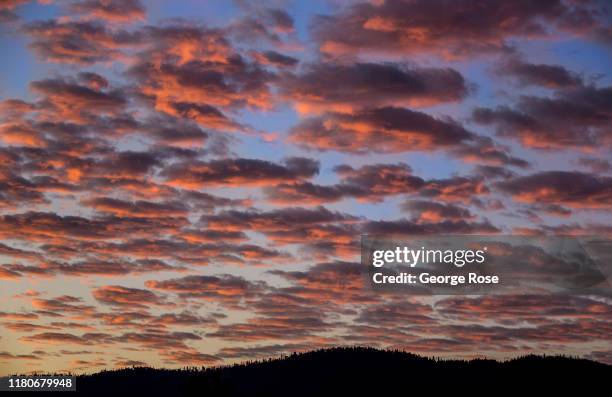 Layer of stratocumulus clouds float across the Valley and the Sierra Nevada Mountain Range on October 7 in Yosemite National Park, California. With...
