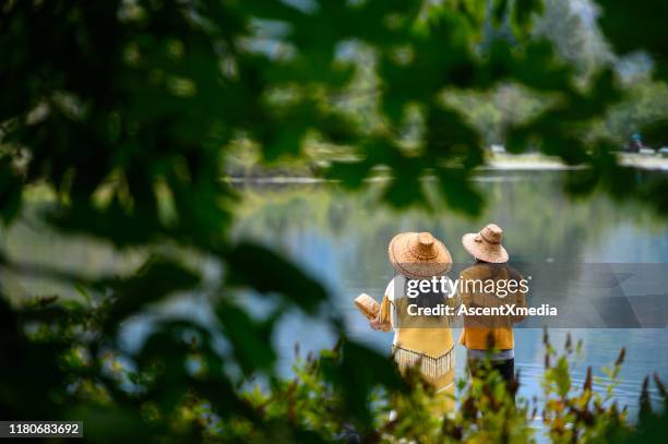 first nations women in traditional clothing - canadian culture stock pictures, royalty-free photos & images
