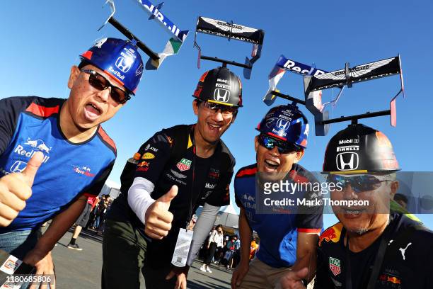 Red Bull Racing and Scuderia Toro Rosso fans show their support before qualifying for the F1 Grand Prix of Japan at Suzuka Circuit on October 13,...