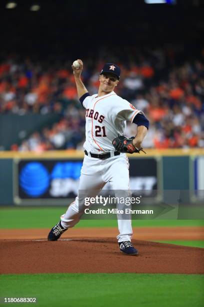 Zack Greinke of the Houston Astros delivers the first pitch against the New York Yankees during the first inning in game one of the American League...