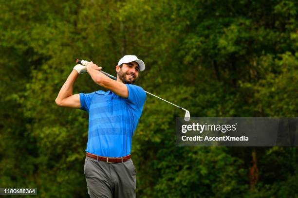 golfer making the drive - professional golfer stock pictures, royalty-free photos & images