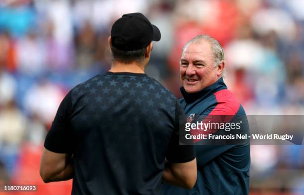 Gary Gold, Head Coach of USA speaks to one of his players prior to the Rugby World Cup 2019 Group C game between USA and Tonga at Hanazono Rugby...