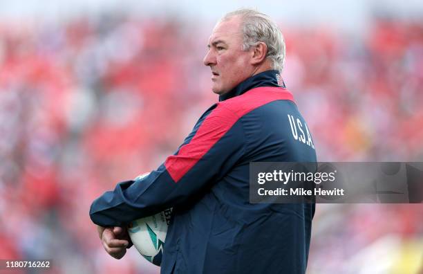 Gary Gold, Head Coach of USA looks on as his team warm up prior to the Rugby World Cup 2019 Group C game between USA and Tonga at Hanazono Rugby...