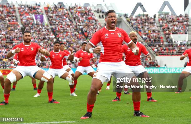 In this handout image provided by World Rugby the Tonga players perform the Sipi Tau prior to the Rugby World Cup 2019 Group C game between USA and...