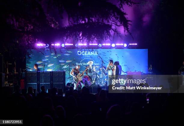 Flea, Anthony Kiedis, Chad Smtih and Josh Klinghoffer of The Red Hot Chili Peppers perform onstage during Oceana's Fourth Annual "Rock Under The...