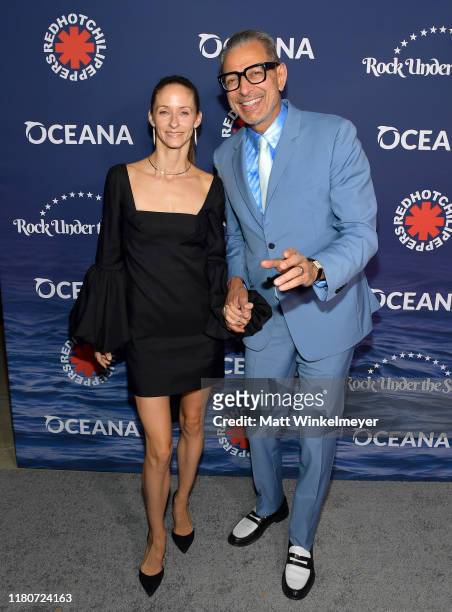 Emilie Livingston and Jeff Goldblum attend Oceana's Fourth Annual "Rock Under The Stars" Featuring The Red Hot Chili Peppers on October 12, 2019 in...