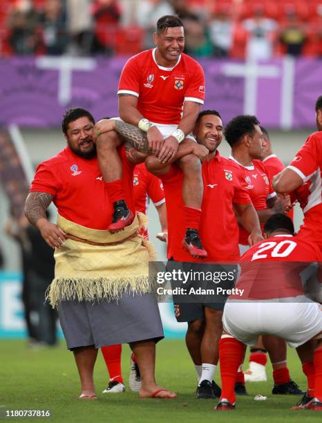 Siale Piutau of Tonga is carried off the pitch following the Rugby World Cup 2019 Group C game between USA and Tonga at Hanazono Rugby Stadium on...