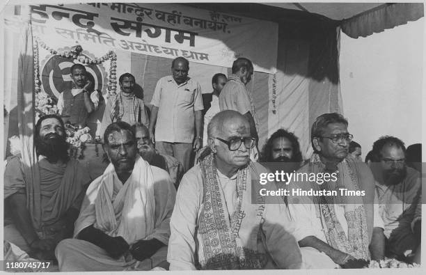 President LK Advani, sits in prayer for construction of Ram Janam Mandir Temple in Ayodhya seated with him are Ashok Singhal and other Prominent...