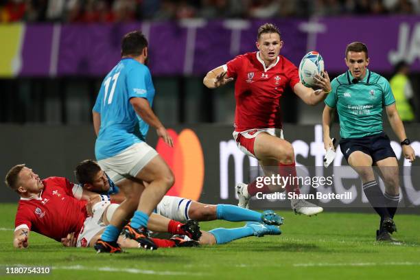 Hallam Amos of Wales makes a break during the Rugby World Cup 2019 Group D game between Wales and Uruguay at Kumamoto Stadium on October 13, 2019 in...