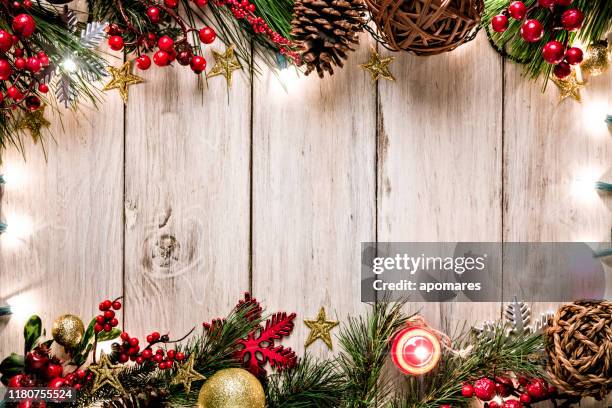 christmas lights and decoration making a frame with copy space. christmas themes. - christmas background copy space stock pictures, royalty-free photos & images