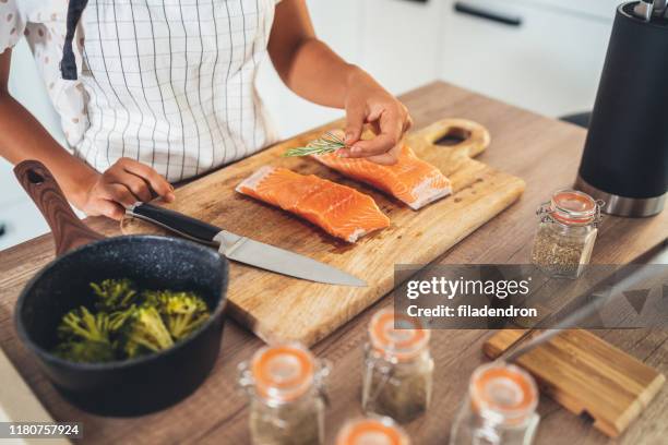 raw salmon fillet - white chopping board stock pictures, royalty-free photos & images