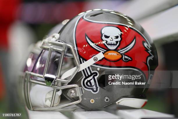 Detailed view of Tampa Bay Buccaneers helmets on the team bench ahead of the NFL game between Carolina Panthers and Tampa Bay Buccaneers at Tottenham...