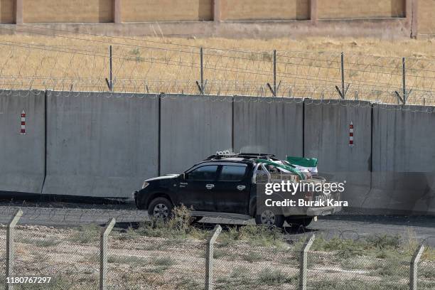 Vehicle believed to be from the Turkish-backed Free Syrian Army, a militant group active in parts of northwest Syria, patrols near the Turkey-Syria...