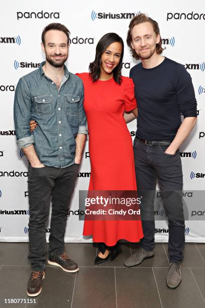 Actors Charlie Cox, Zawe Ashton and Tom Hiddleston visit the SiriusXM Studios on November 7, 2019 in New York City.