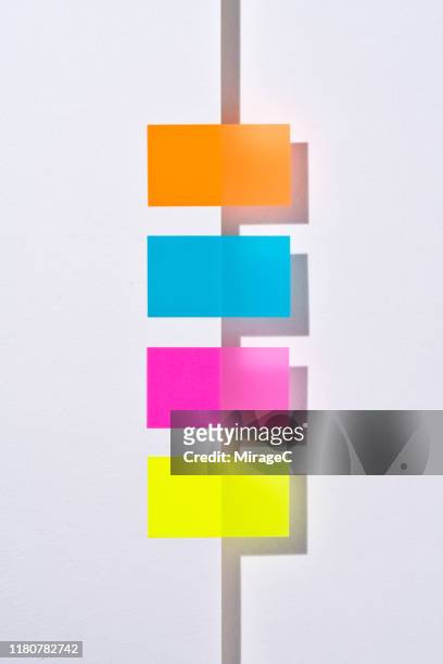 adhesive tags at the edge of paper page - bookmark stock pictures, royalty-free photos & images