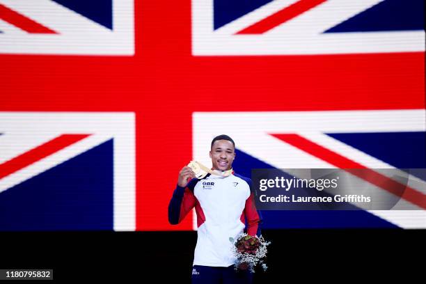 Gold medalist, Joe Fraser of Great Britain on the podium following Men's Parallel Bars Final day 10 of the 49th FIG Artistic Gymnastics World...