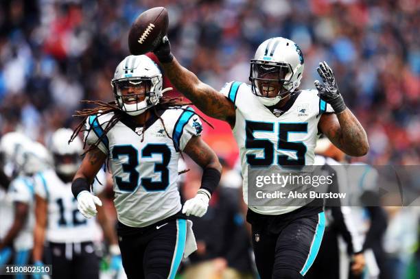 Bruce Irvin of the Carolina Panthers celebrates with teammate Tre Boston during the NFL match between the Carolina Panthers and Tampa Bay Buccaneers...