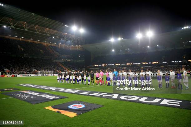 Players, officials and mascots line up prior to the UEFA Europa League group K match between Wolverhampton Wanderers and Slovan Bratislava at...