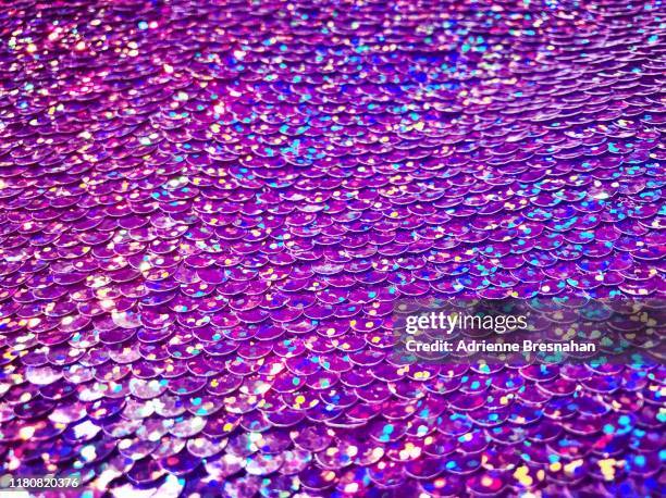 purple holographic sequined surface - sequin stock pictures, royalty-free photos & images