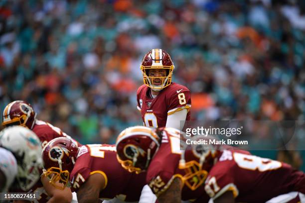 Case Keenum of the Washington Redskins under center against the Miami Dolphins in the first quarter at Hard Rock Stadium on October 13, 2019 in...