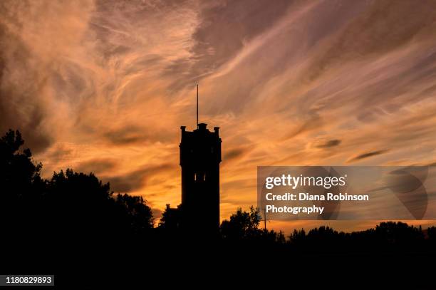 view of the old milwaukee depot at sunset, missoula, montana - missoula stock pictures, royalty-free photos & images