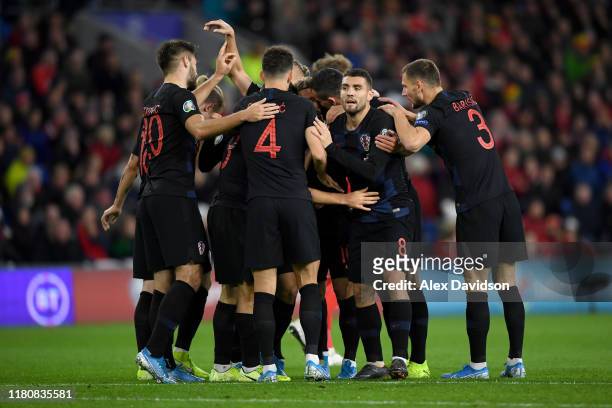 Nikola Vlasic of Croatia celebrates with teammates after scoring the opening goal during the UEFA Euro 2020 qualifier between Wales and Croatia at...