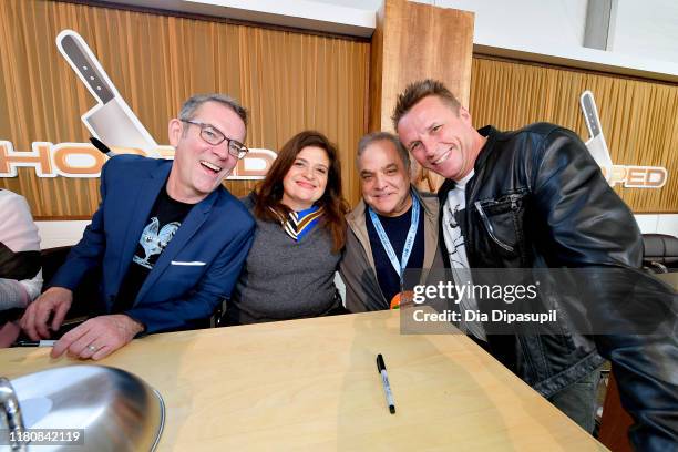 Ted Allen, Chef Alex Guarnaschelli, NYCWFF Founder Lee Brian Schrager and Chef Marc Murphy pose during Sunday Brunch hosted by Marc Murphy and Devour...